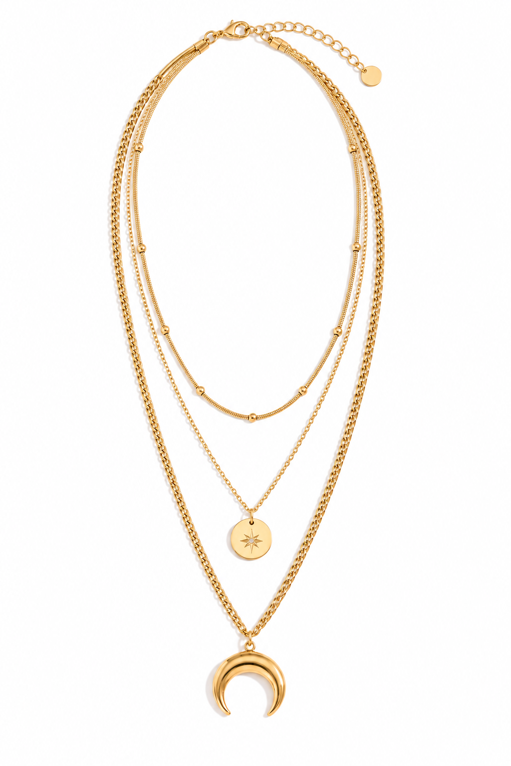 A gold-toned multi-layered necklace featuring a long curb chain, a delicate chain with small bead accents, a round star disc pendant, and a larger crescent moon pendant, displayed on a clean white background.